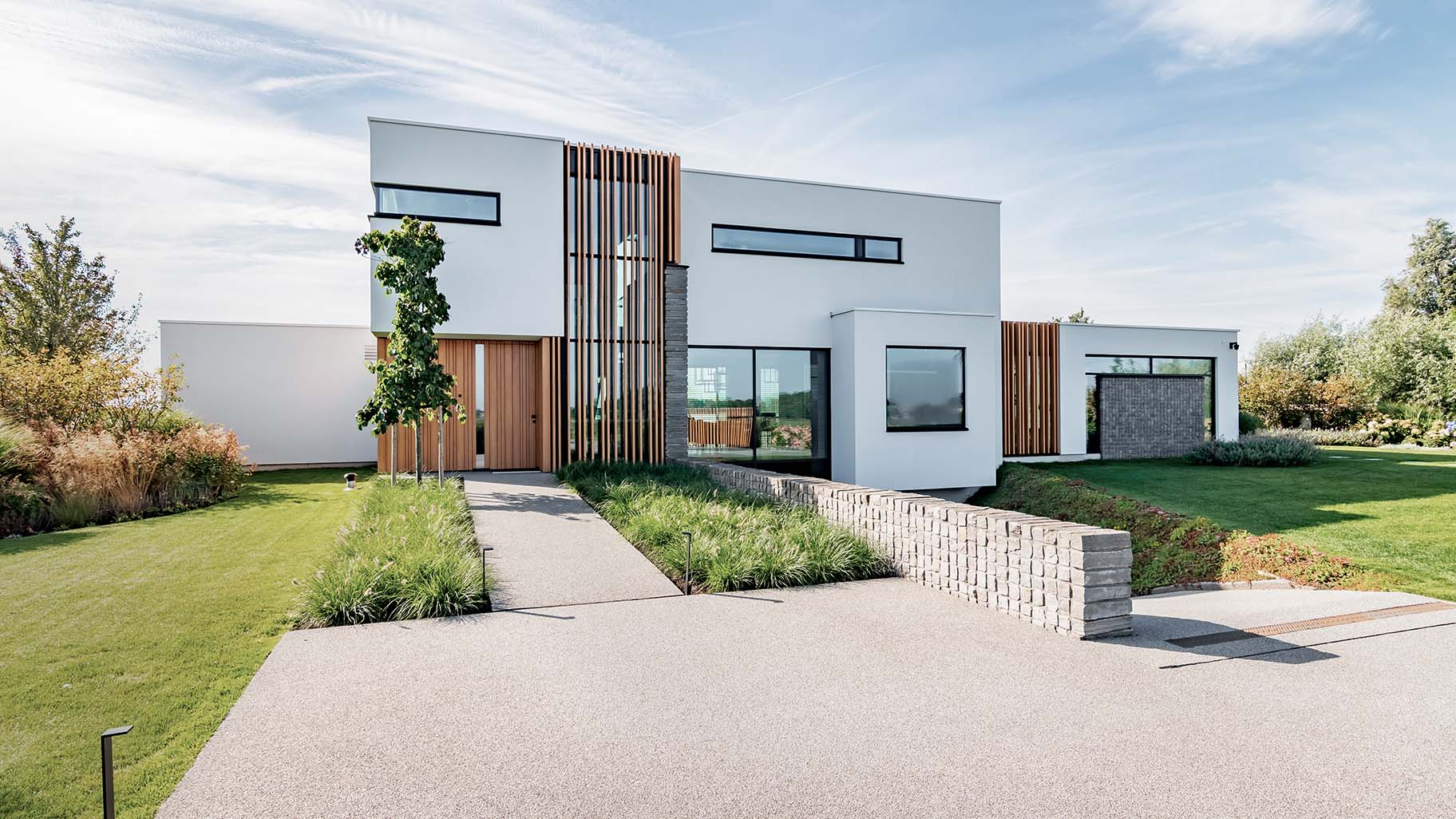 Bespoke garage door for a boathouse at a waterside villa