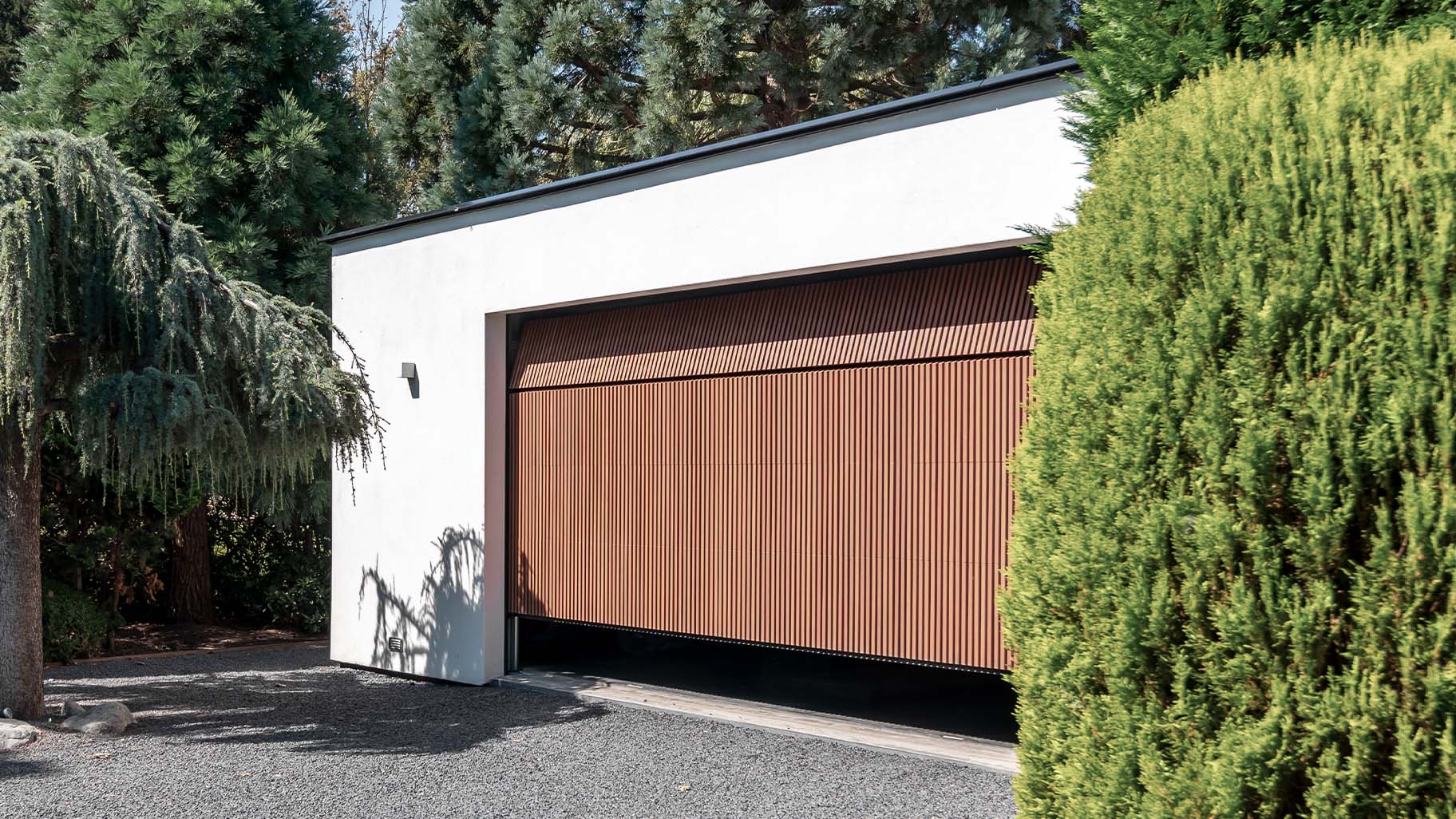Six-metre-wide wooden garage door at an Ibiza-style house