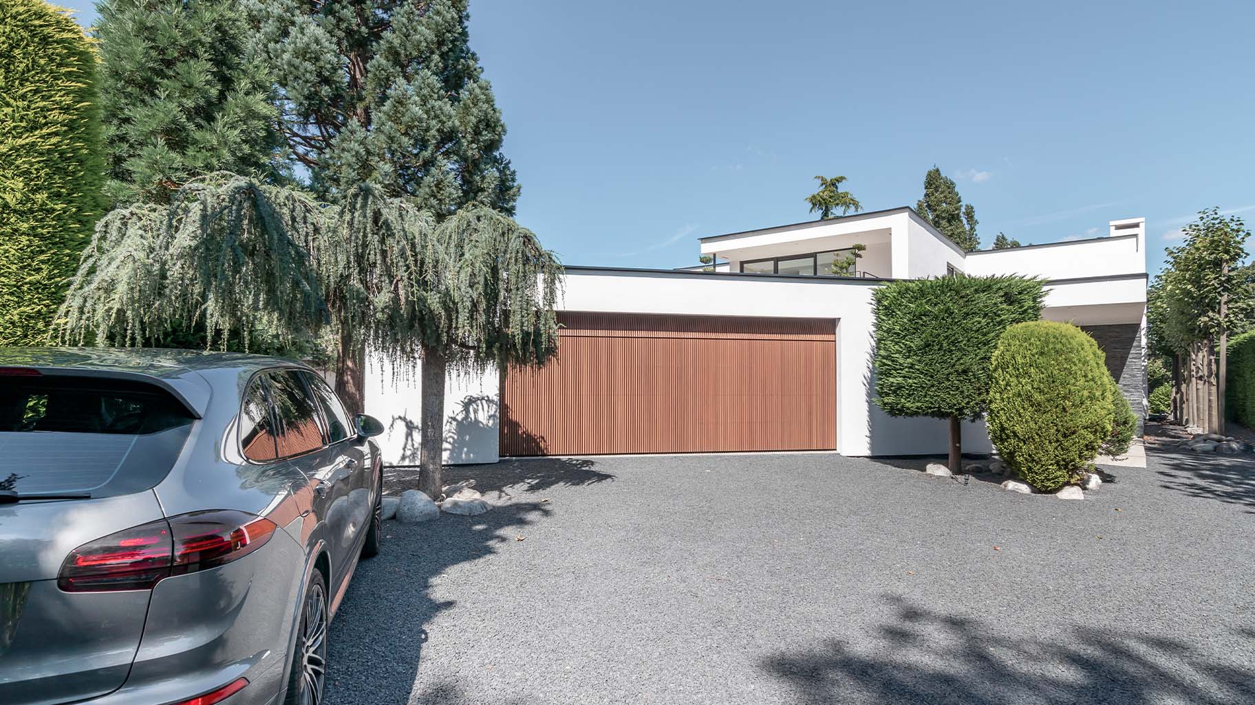 Six-metre-wide wooden garage door at an Ibiza-style house