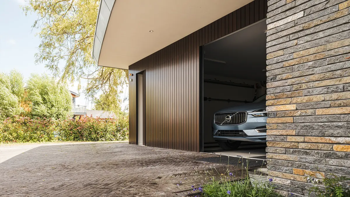 Side sliding garage door