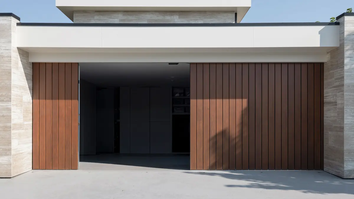 Side sliding garage door