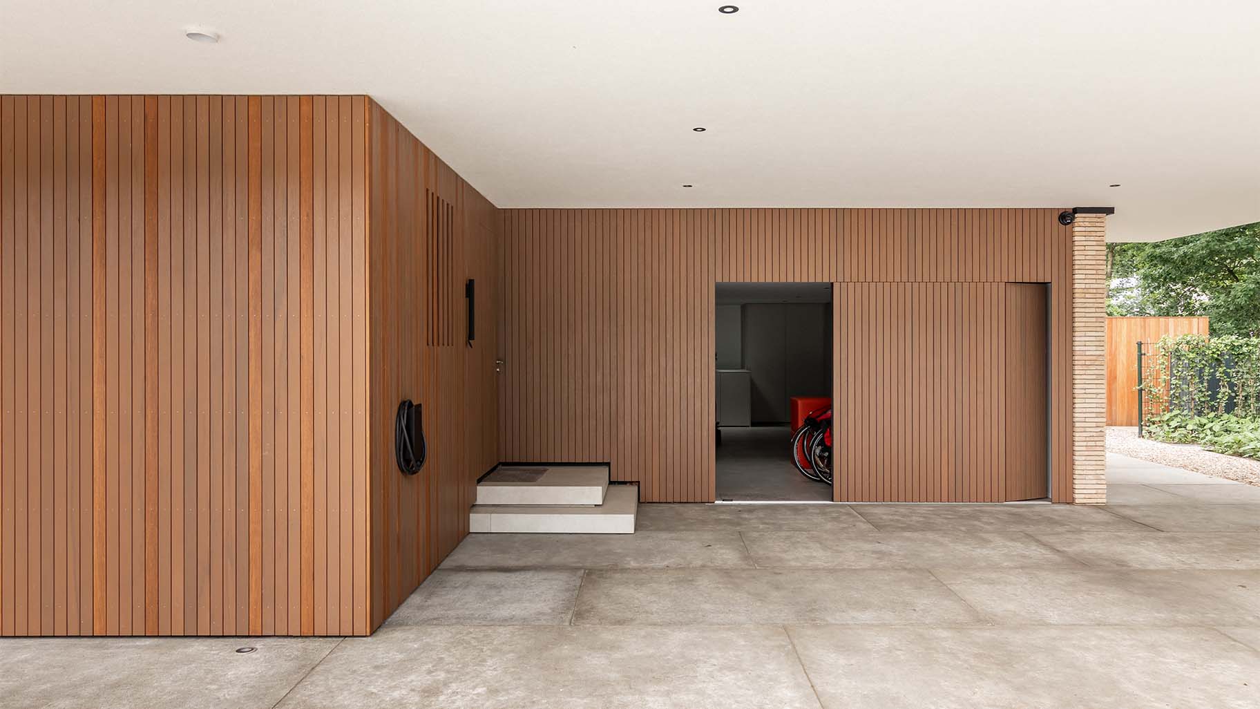 Fraké side-opening garage door made of wooden slats
