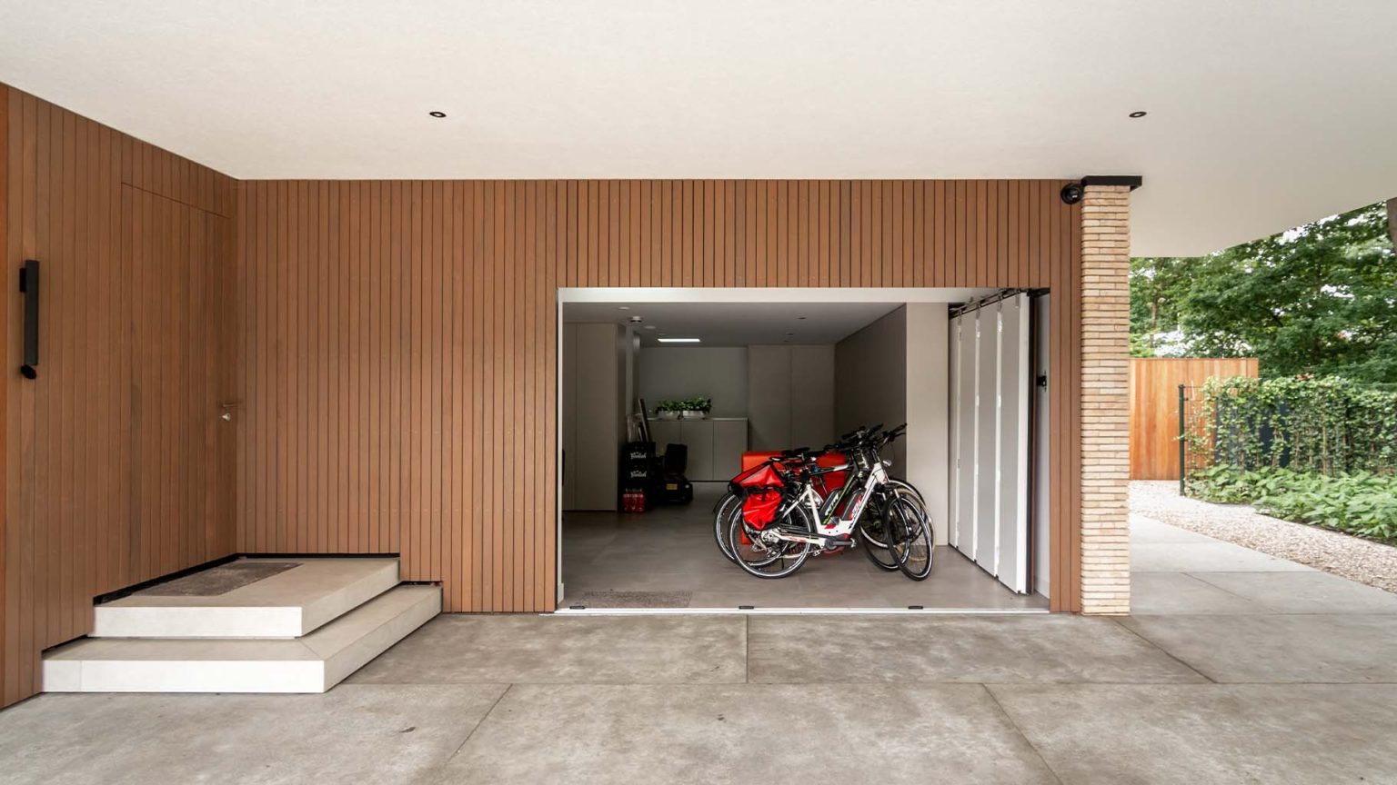 Frake side-opening garage door