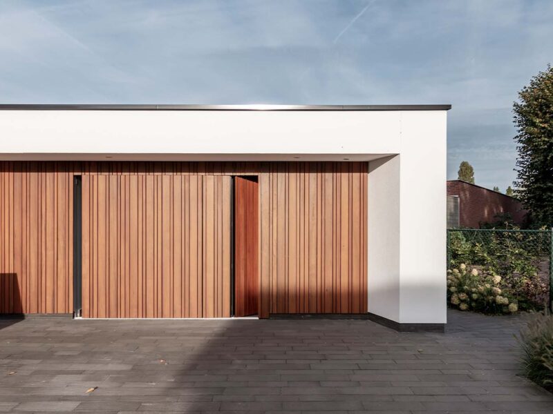 Side sliding garage doors