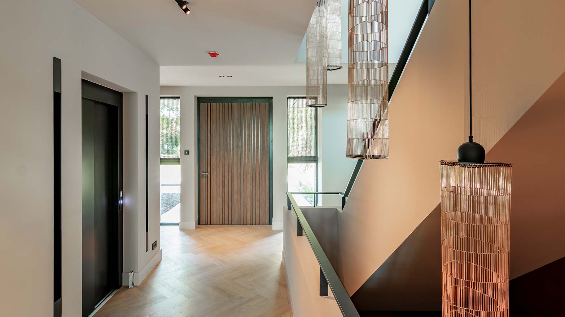 Pivot Door in Afrormosia wood