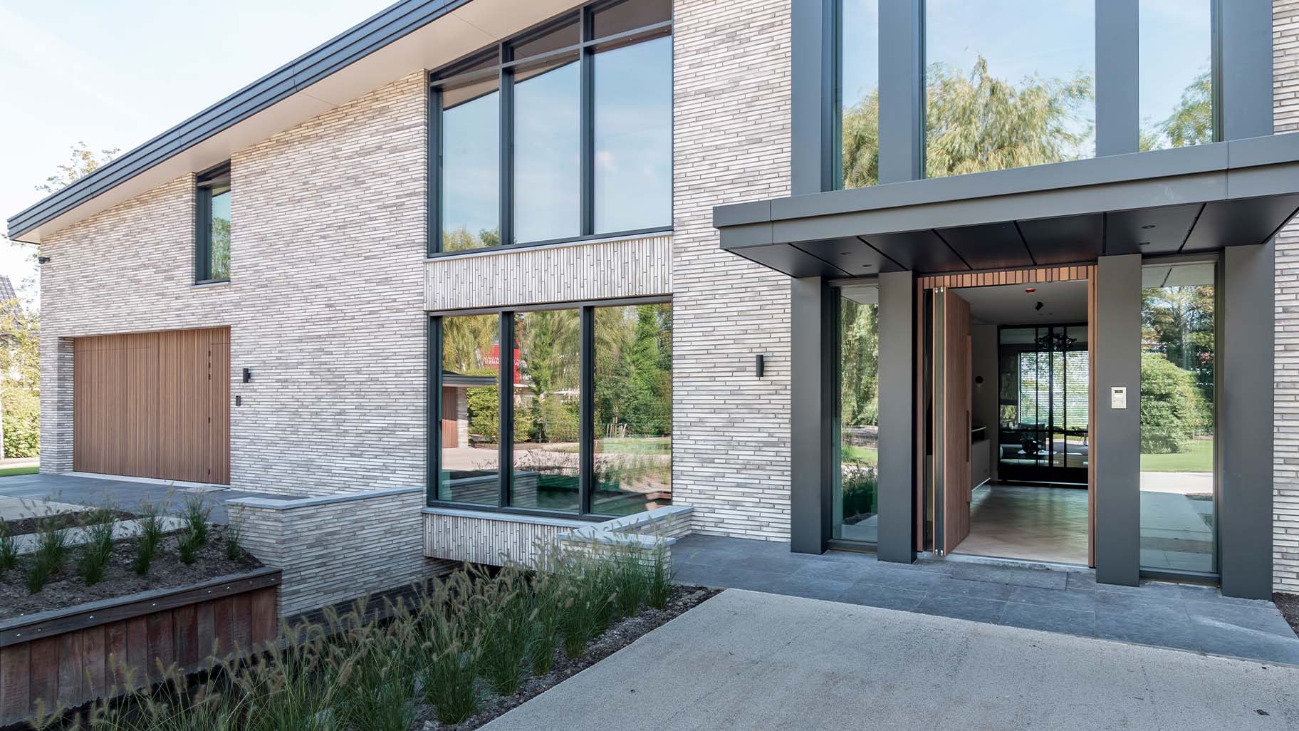 Pivot Door in Afrormosia wood