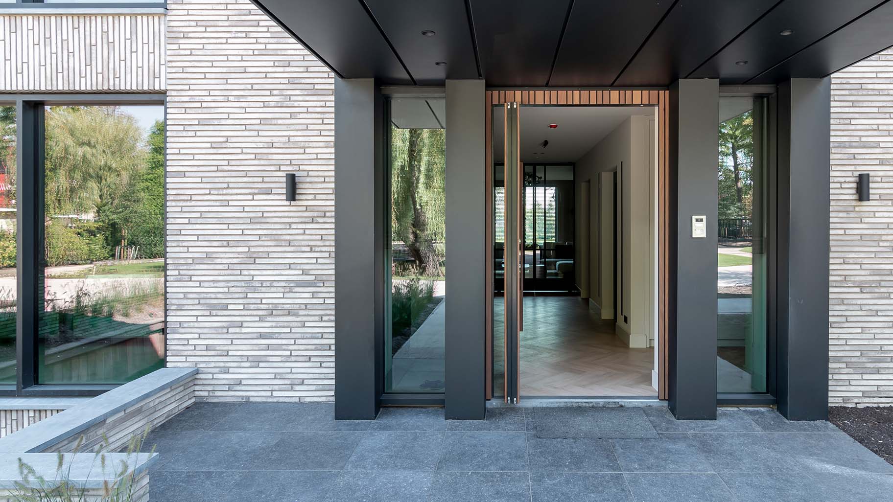 Pivot Door in Afrormosia wood
