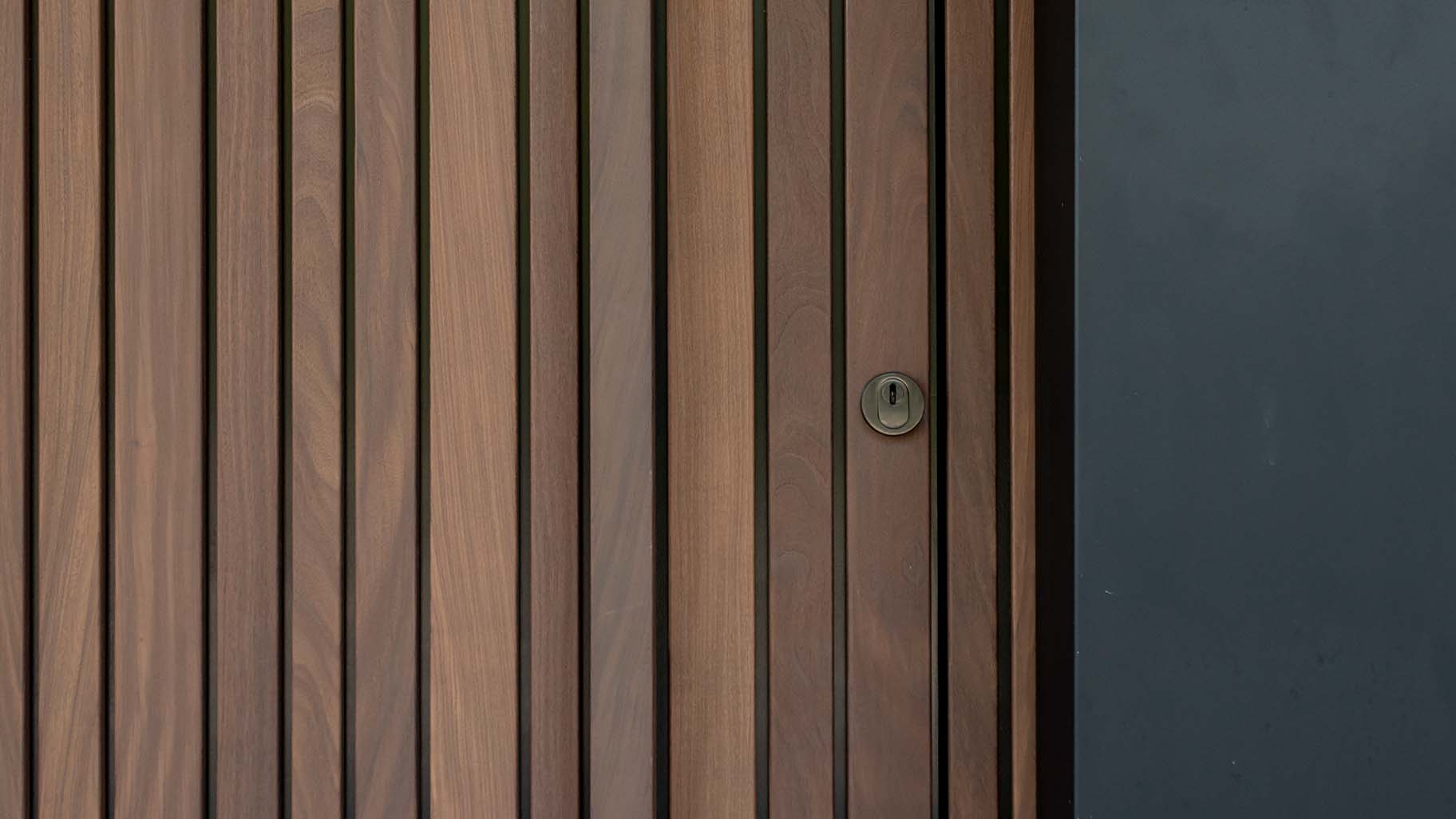 Pivot Door in Afrormosia wood